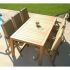 Royal Teak Collection COMF Comfort Teak Table in a Patio Setting