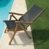 Royal Teak Collection FLBL Florida Teak Sling Chair in a Patio Setting
