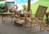 Royal Teak Collection RKC Classic Highback Rocking Chair in a Patio Setting